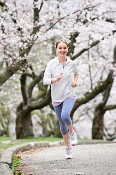 Girl jogging in park
