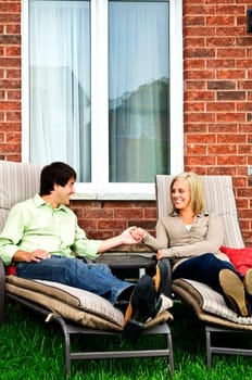 Happy couple relaxing at home
