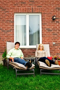 Happy couple relaxing at home