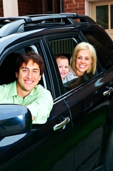 Happy family in car