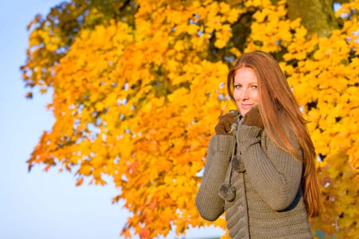 Autumn sunset park - red hair woman fashion