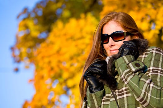 Autumn sunset park - red hair woman fashion
