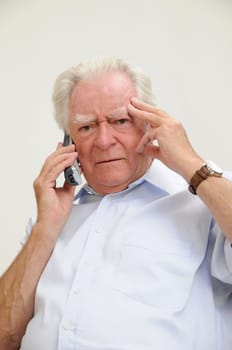 Pensioner with mobile phone