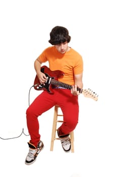 Teen boy with guitar.
