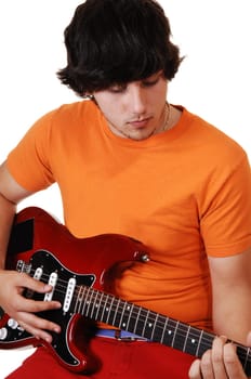 Teen boy with guitar.