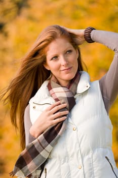 Autumn park - long red hair woman fashion