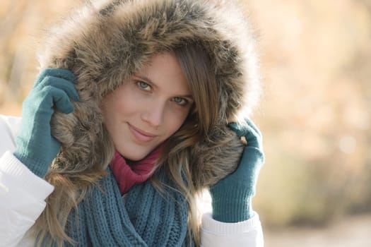 Winter fashion - woman with fur hood