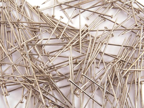 Pin used when sewing on a plain white background.