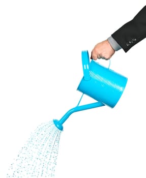Hand pouring water from watering can