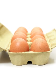 brown eggs in box