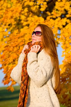 Autumn country sunset - long red hair woman