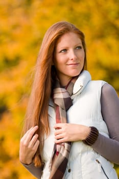 Autumn park - long red hair woman fashion