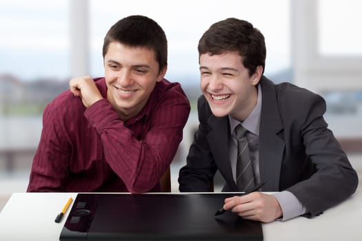 Two people having fun about a project