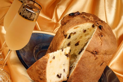 Italian Christmas composition with panettone and spumante