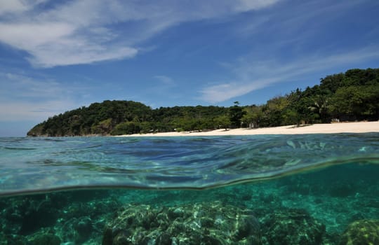 Half and half shot of an island in the Philippines