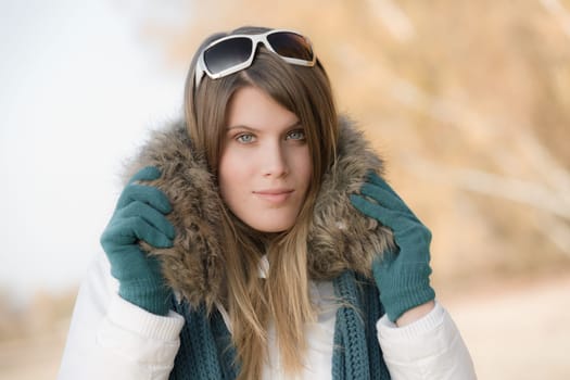 Winter fashion - woman with fur hood