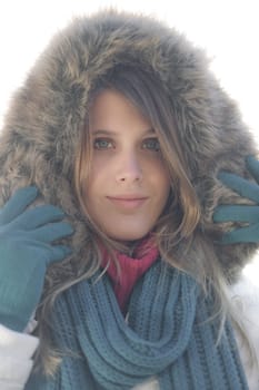 Winter fashion - woman on foggy day