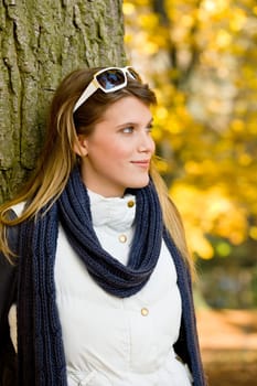 Autumn park - fashion woman with sunglasses