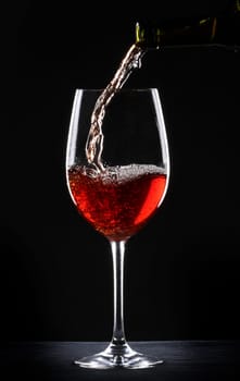 Pouring red wine