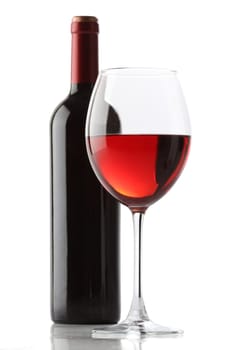 Glass of red wine and a bottle