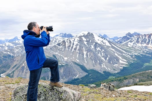 Photographer in mountains