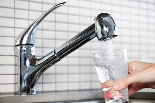 Filling glass of tap water