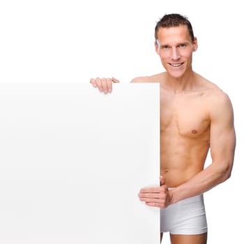 Young man with billboard