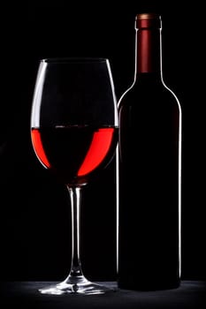 Red wine bottle and glass