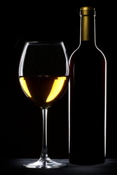 White wine bottle and glass