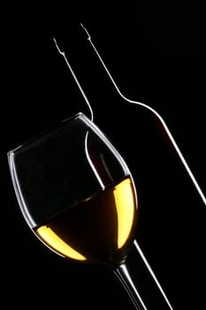 White wine bottle and glass