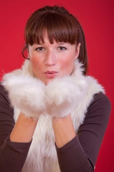 woman sending air kiss