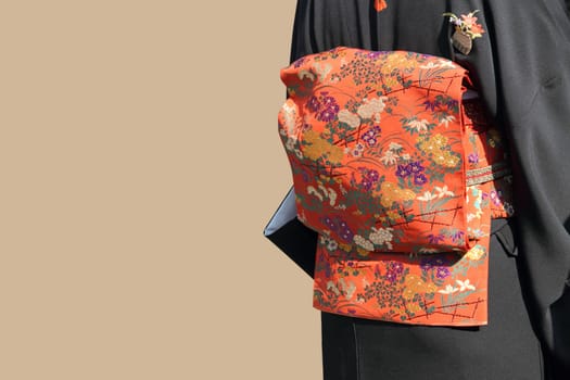 Woman in kimono awaits ceremony