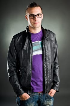 Man with glasses and leather jacket