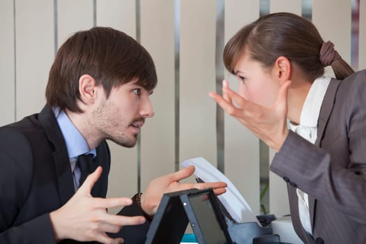 two office workers in conflict