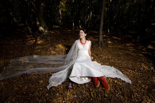 Beautiful bride in fairy forest