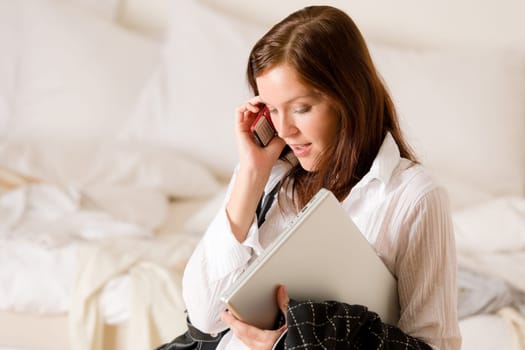 On the phone - woman home in bedroom