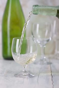 Pouring white wine