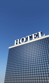 Silver HOTEL Sign on the Roof 03