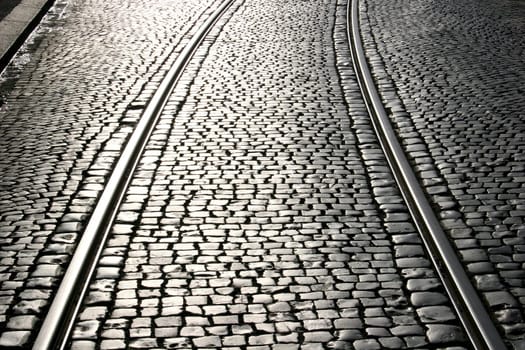 Tram tracks on cobblestone pavements