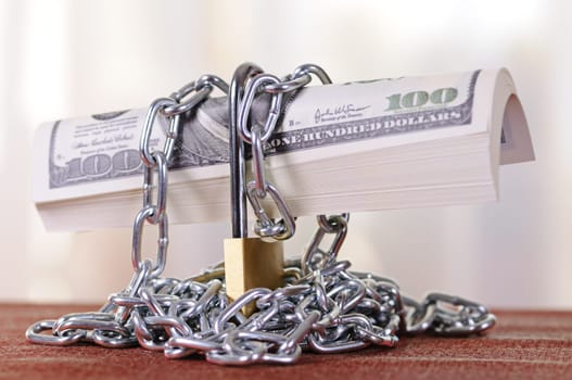 padlock with dollars