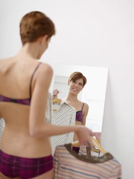 woman getting dressed