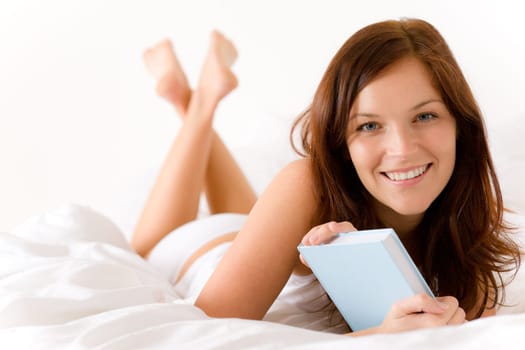 Bedroom - young woman with book