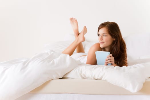 Bedroom - young woman with book