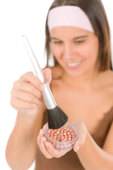 Make-up skin care - woman apply pearl powder