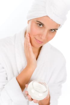 Teenager skin care - woman apply moisturizer