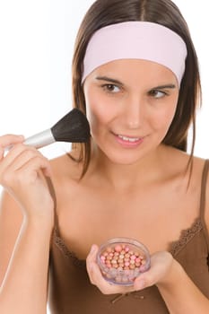 Make-up skin care - woman apply pearl powder