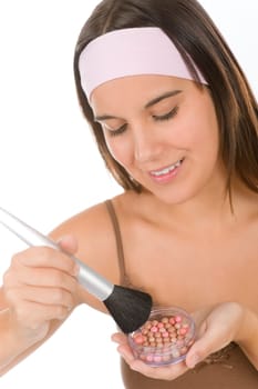 Make-up skin care - woman apply pearl powder