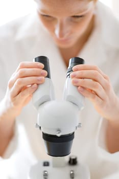 Microscope laboratory - woman medical research