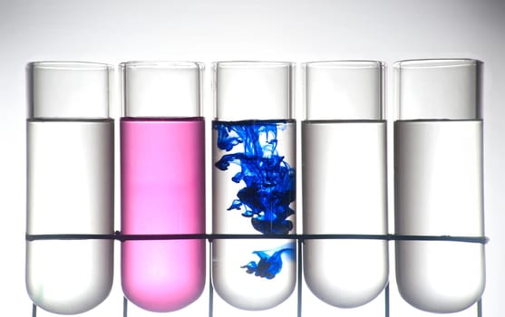 Ink in chemistry container