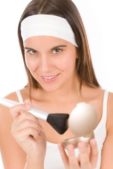 Make-up skin care - woman apply powder